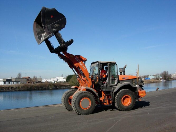 Wheel loader high tip bucket